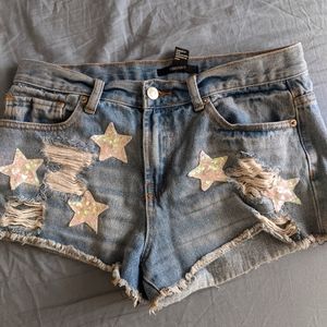 Star sequin distressed denim shorts